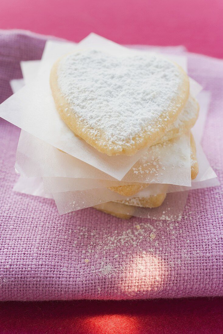 Delicate pastry hearts with icing sugar