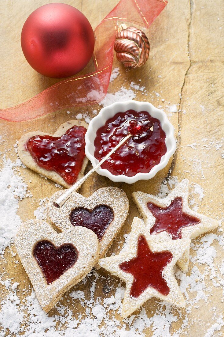 Star- and heart-shaped biscuits with raspberry jam