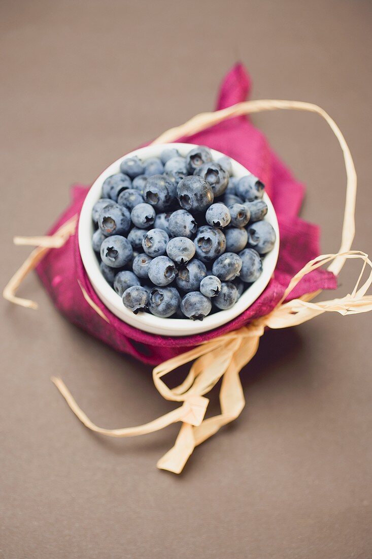 Blueberries in white bowl to give as a gift