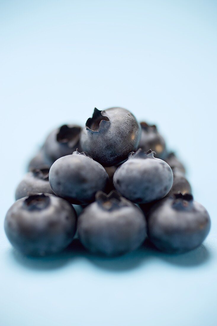 Blueberries on blue background