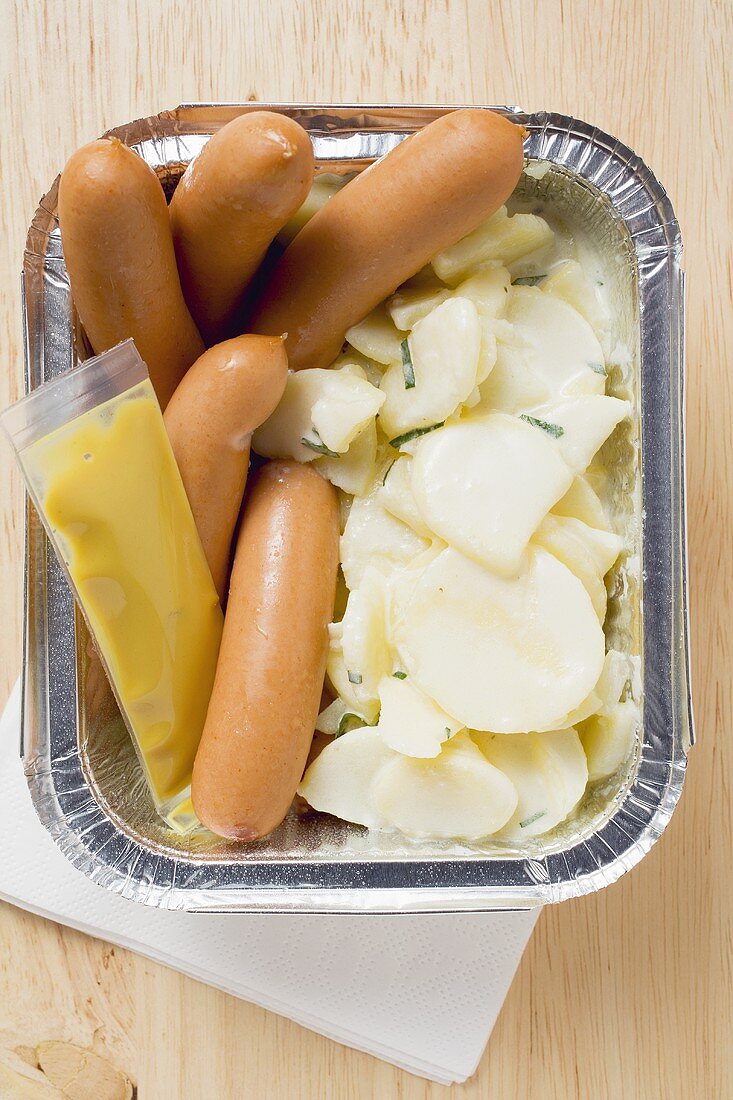 Frankfurters, potato salad & mustard in aluminium container