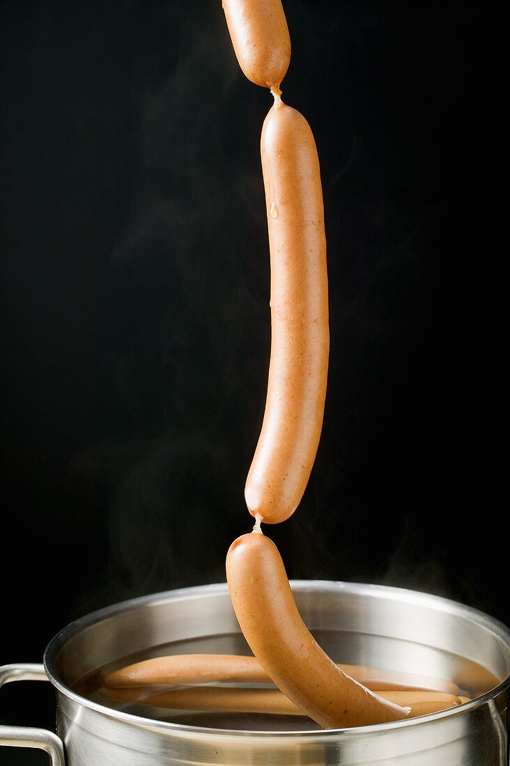 Lifting frankfurters out of hot water