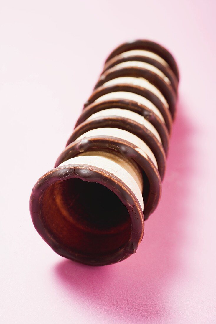 Row of empty chocolate-dipped ice cream cones