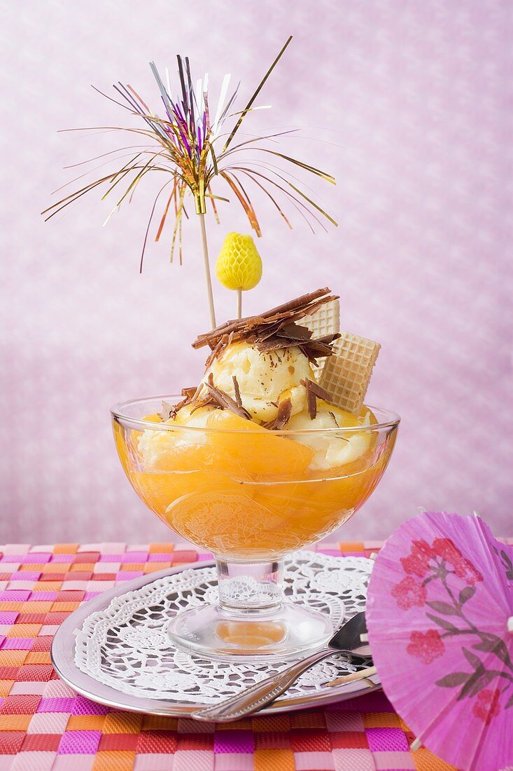 Fruity ice cream sundae with apricots & chocolate shavings