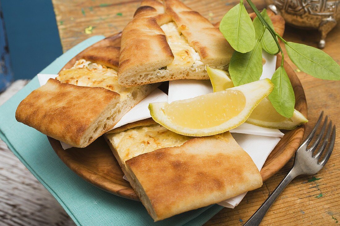 Pide (Turkish flatbread) with sheep's cheese filling