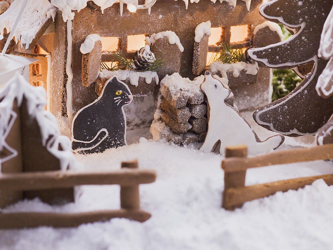 Gingerbread house with gingerbread animals