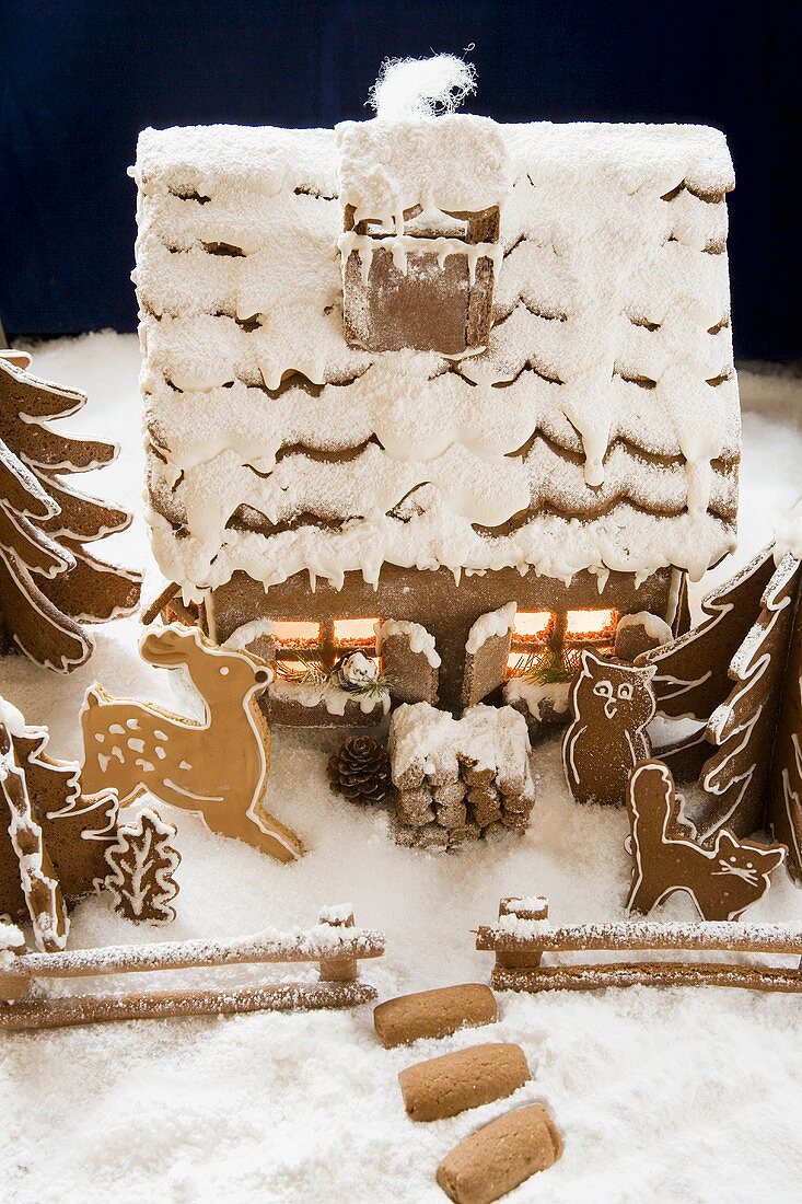 Gingerbread house with atmospheric lighting,  animal figures