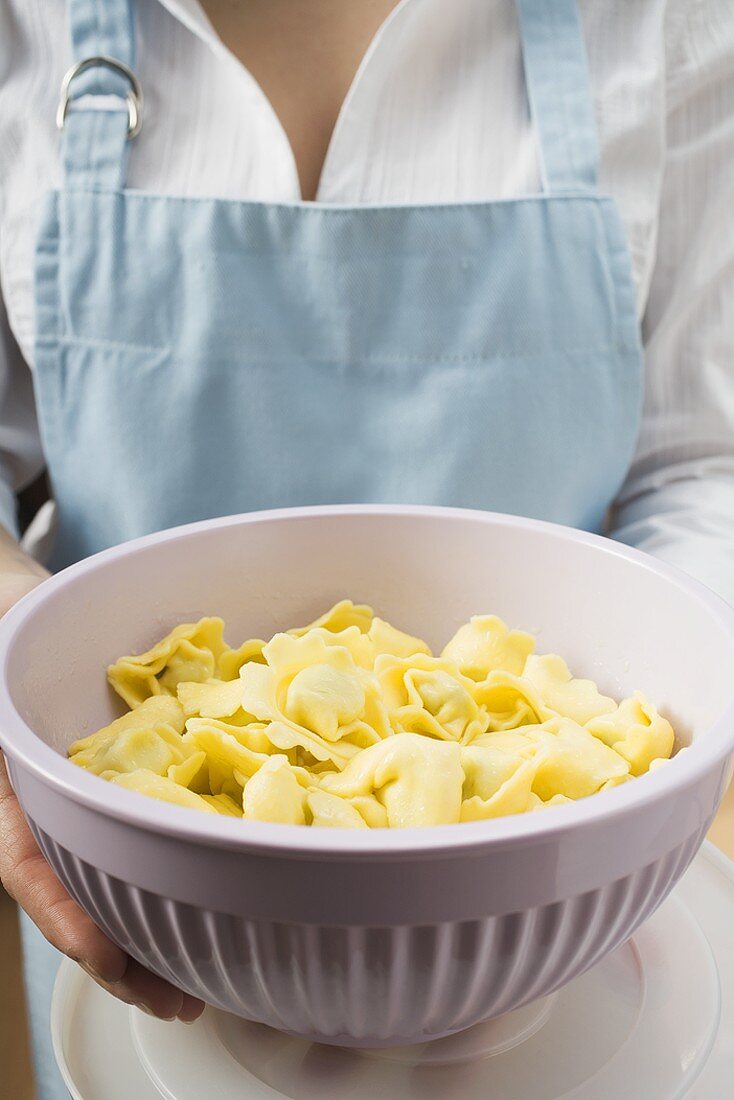 Serving bowl of cooked tortellini