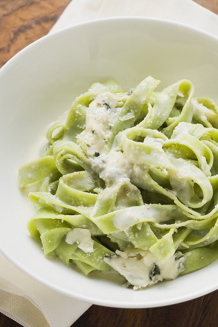 Green ribbon pasta with blue cheese