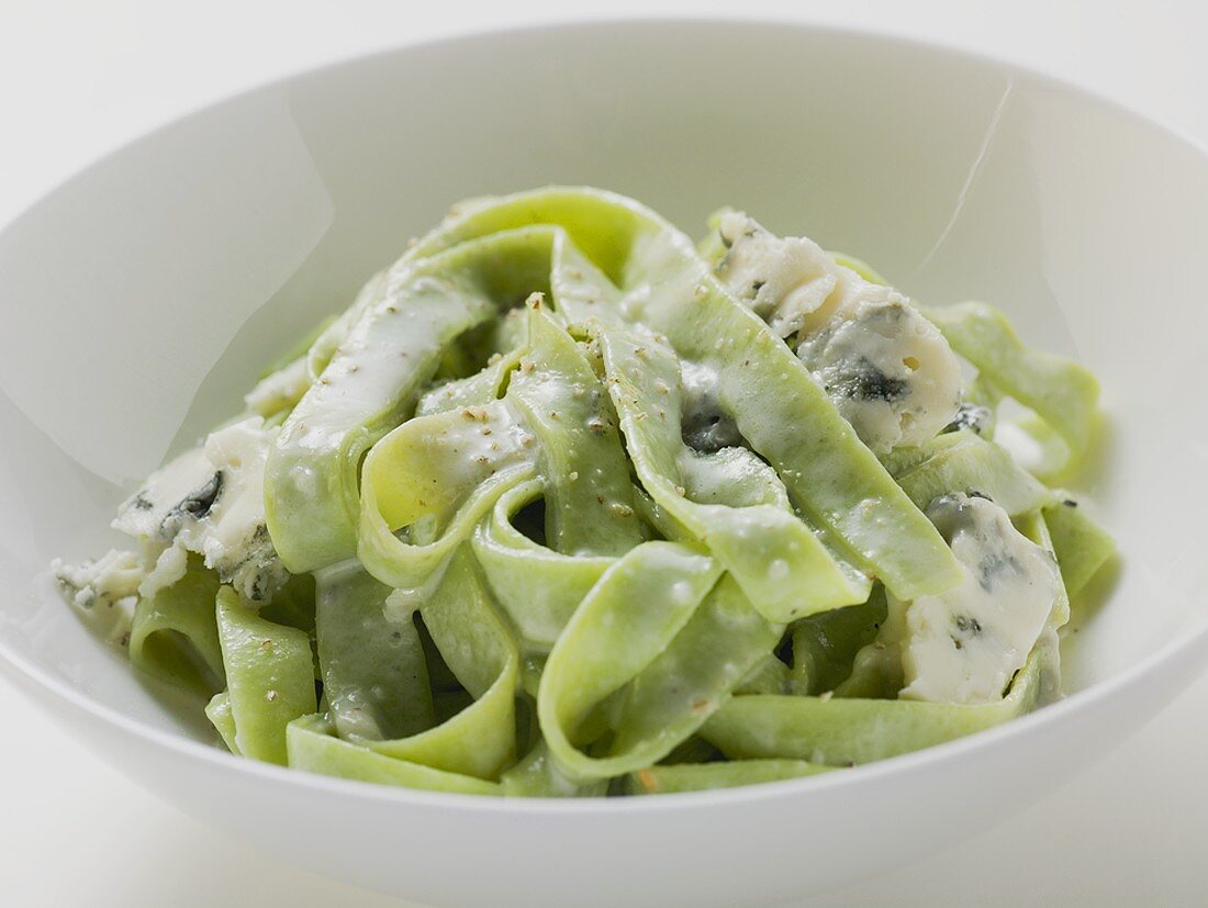 Green ribbon pasta with blue cheese