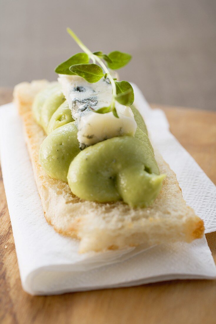 Bruschetta with avocado spread and blue cheese