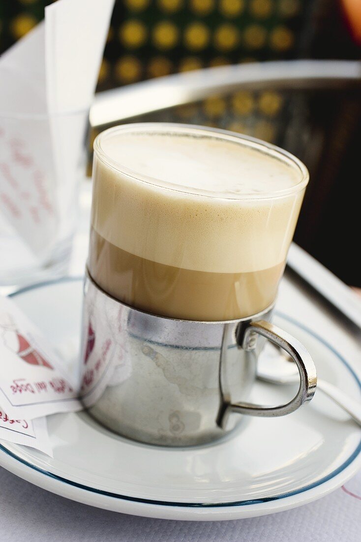 Latte macchiato on table in café