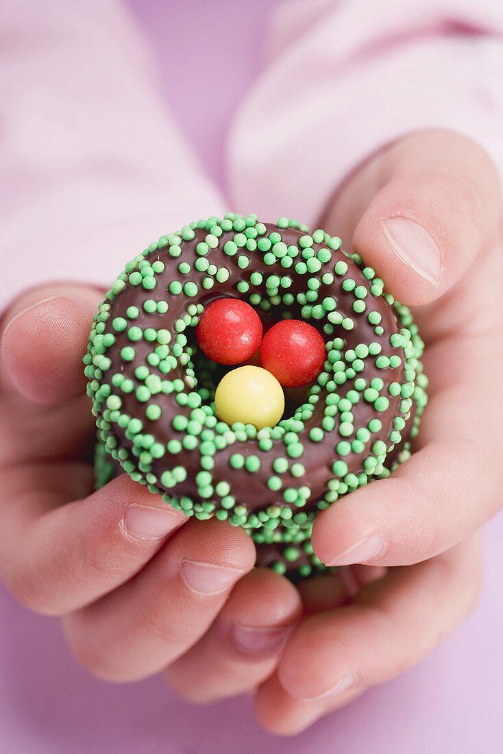 Child's hands holding Easter sweets
