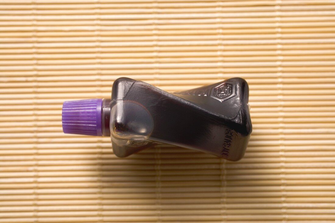 Soy sauce in small plastic take-away bottle