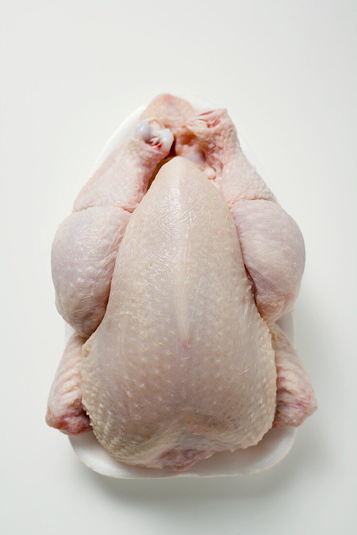 Fresh chicken on polystyrene tray