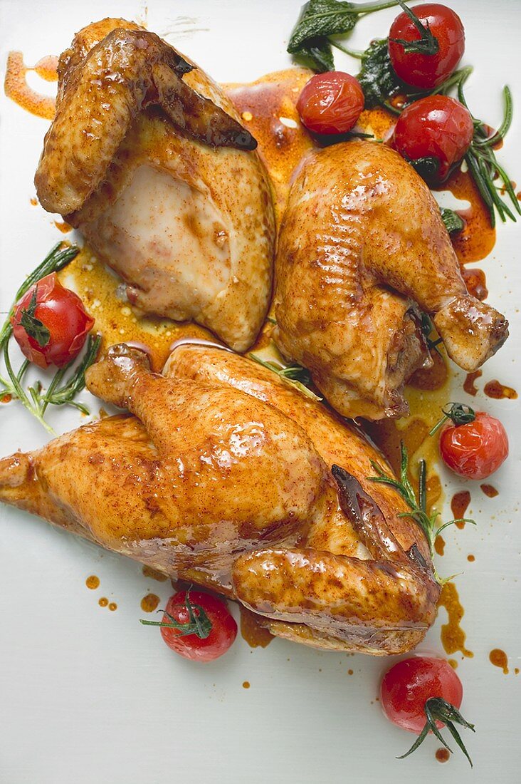 Roast chicken, jointed, with cherry tomatoes