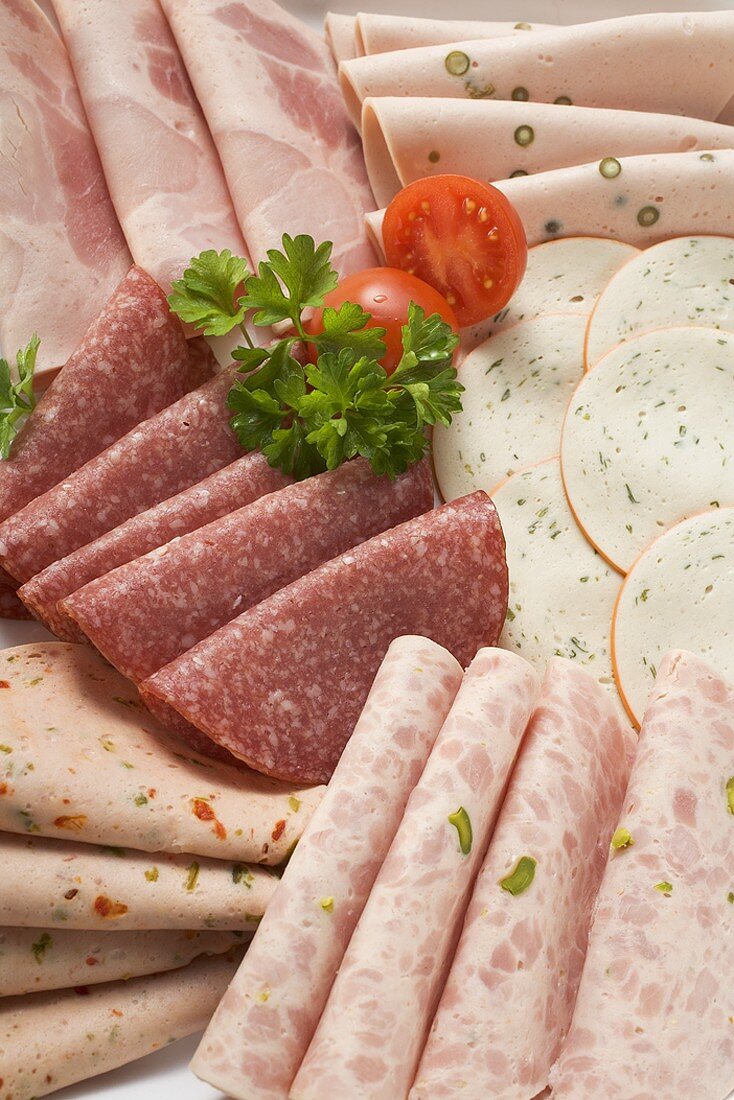 Cold cuts platter with cherry tomatoes & parsley (detail)