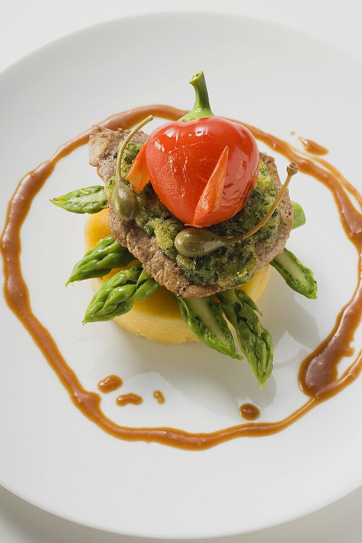 Escalope with herbs, capers, pepper & asparagus on polenta