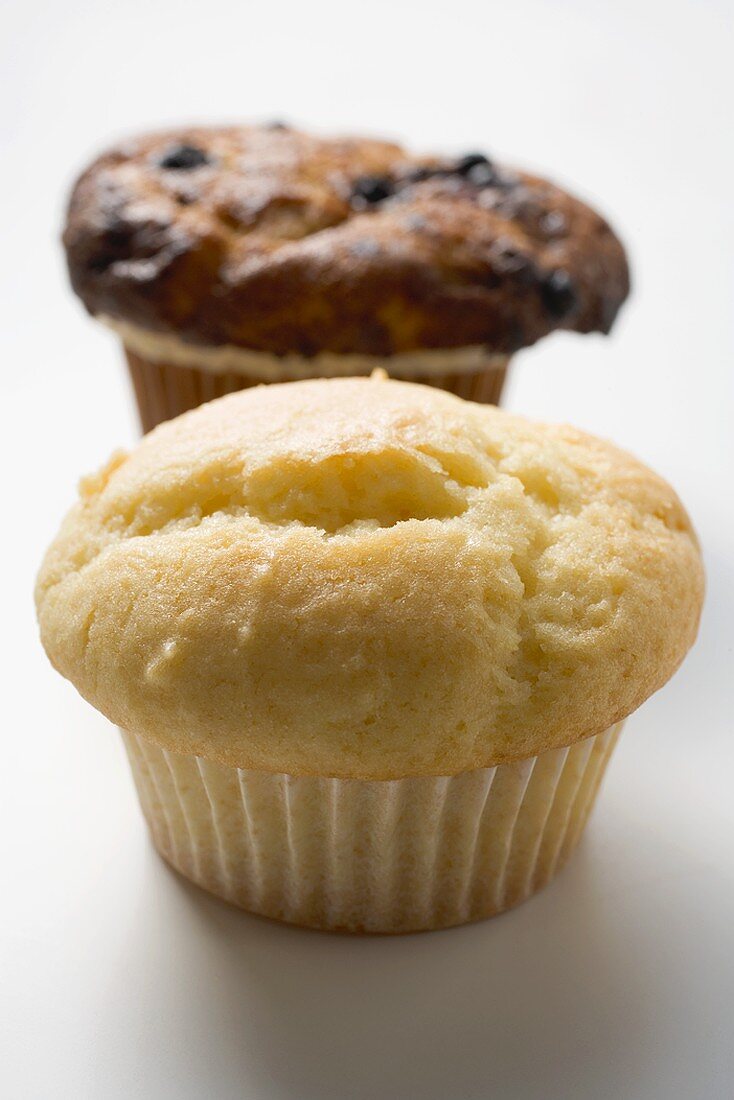 Two different muffins in paper cases