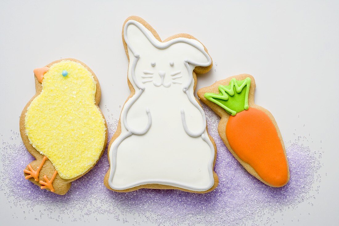Three different Easter biscuits (chick, Easter Bunny, carrot)