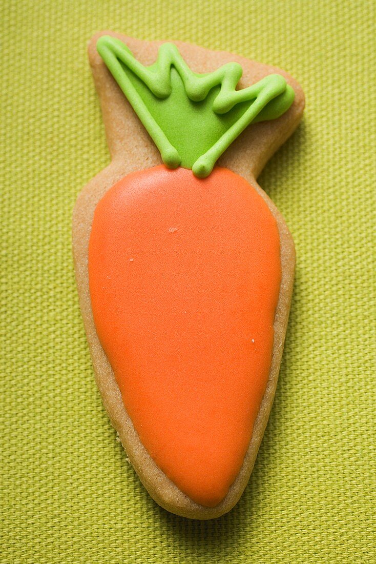 Easter biscuit (carrot) on linen background