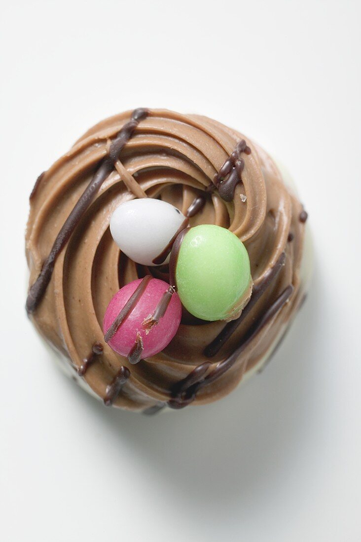 Sugar eggs on chocolate cream for Easter