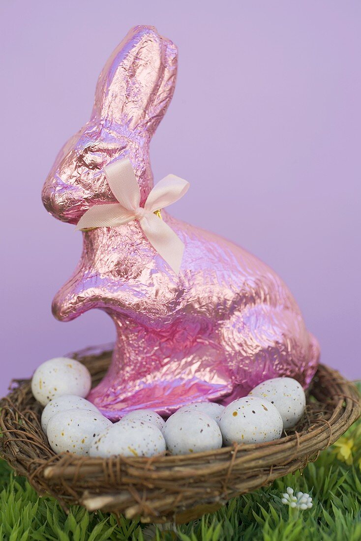 Pink Easter Bunny and Easter eggs in basket