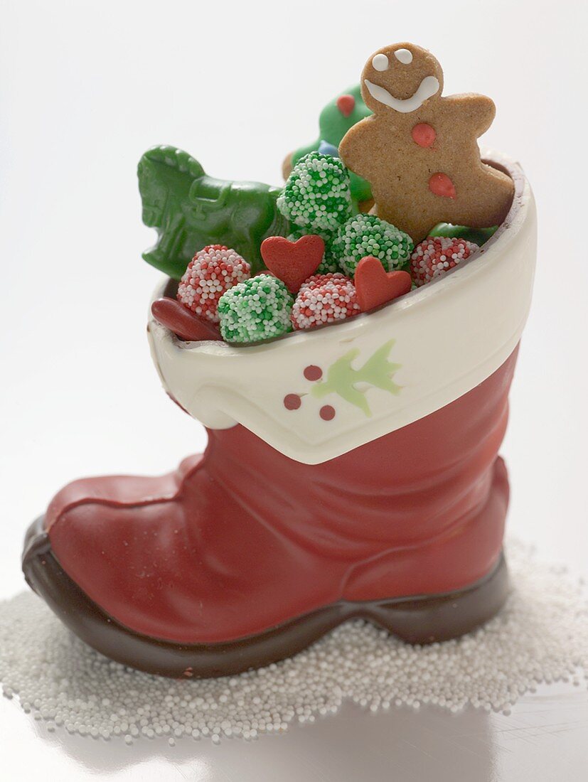 Christmas biscuits and sweets in chocolate boot