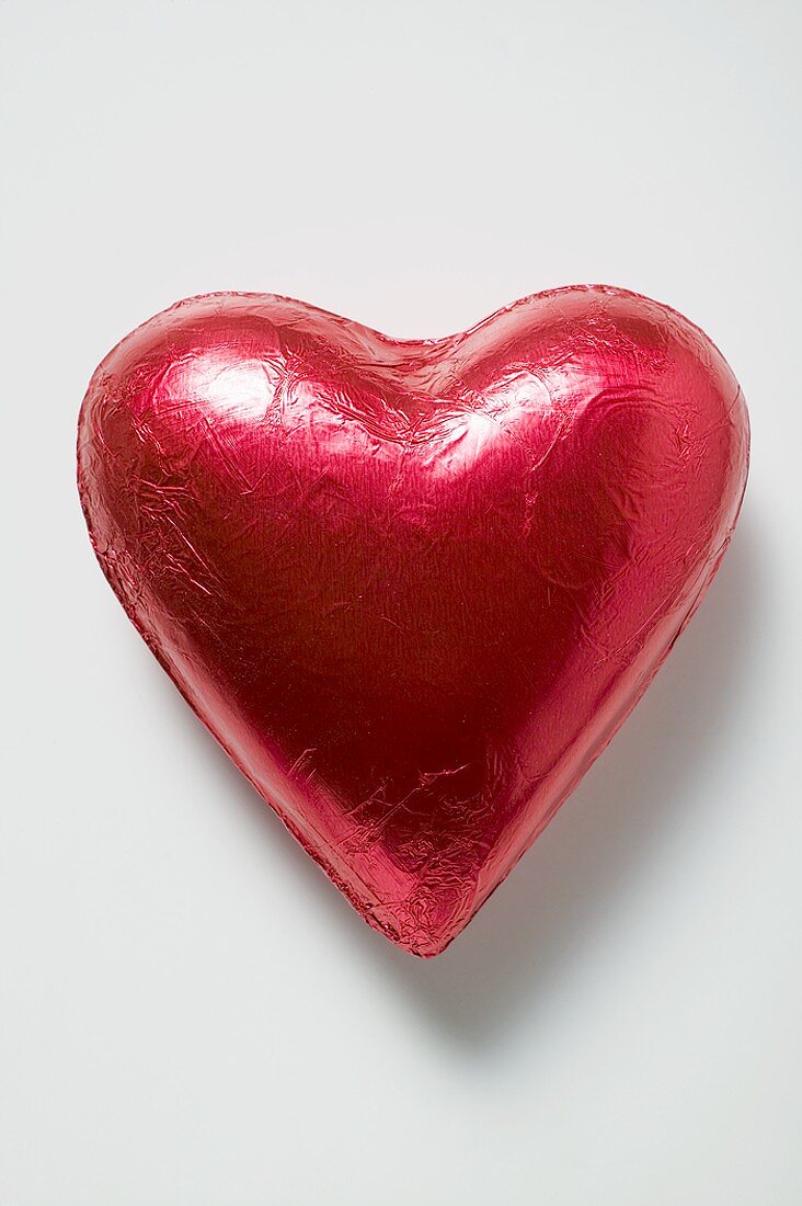 Chocolate heart in red foil