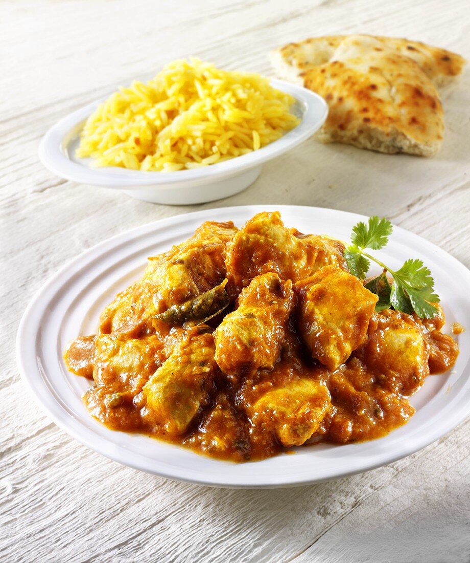 Chicken curry, rice and flatbread (India)