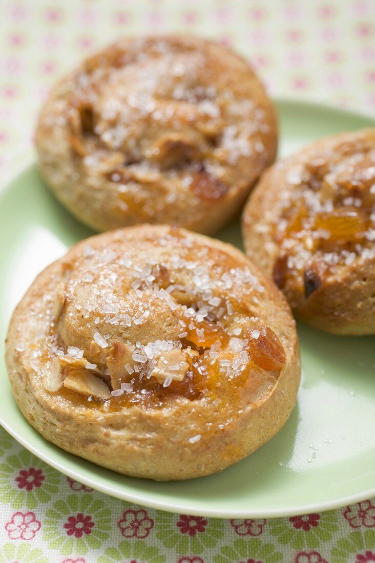 Yeast buns with sugar and flaked almonds