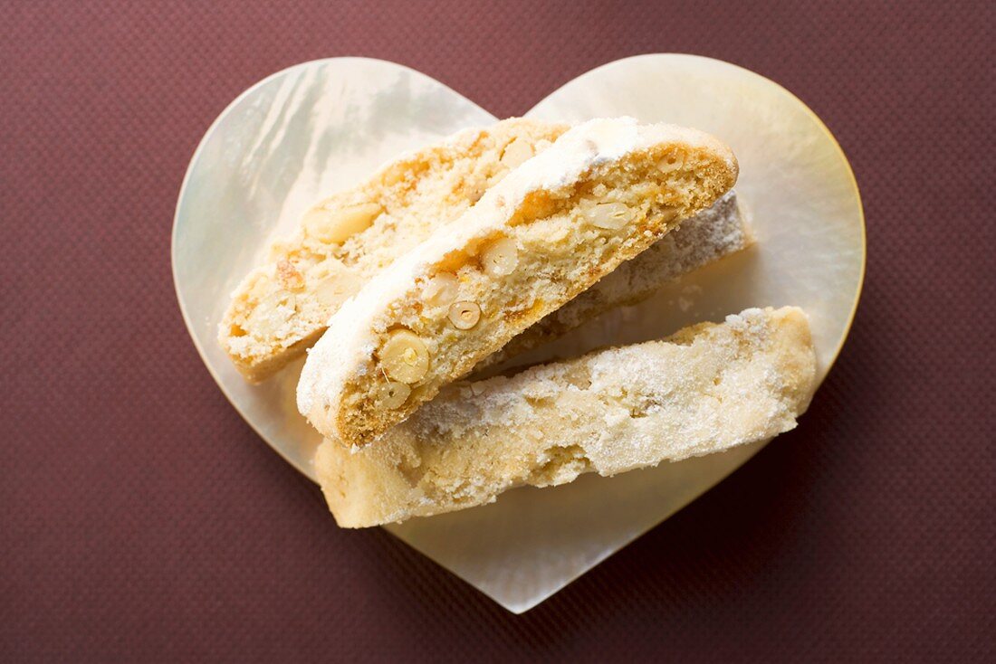 Cantucci (Italian almond biscuits) on heart-shaped plate