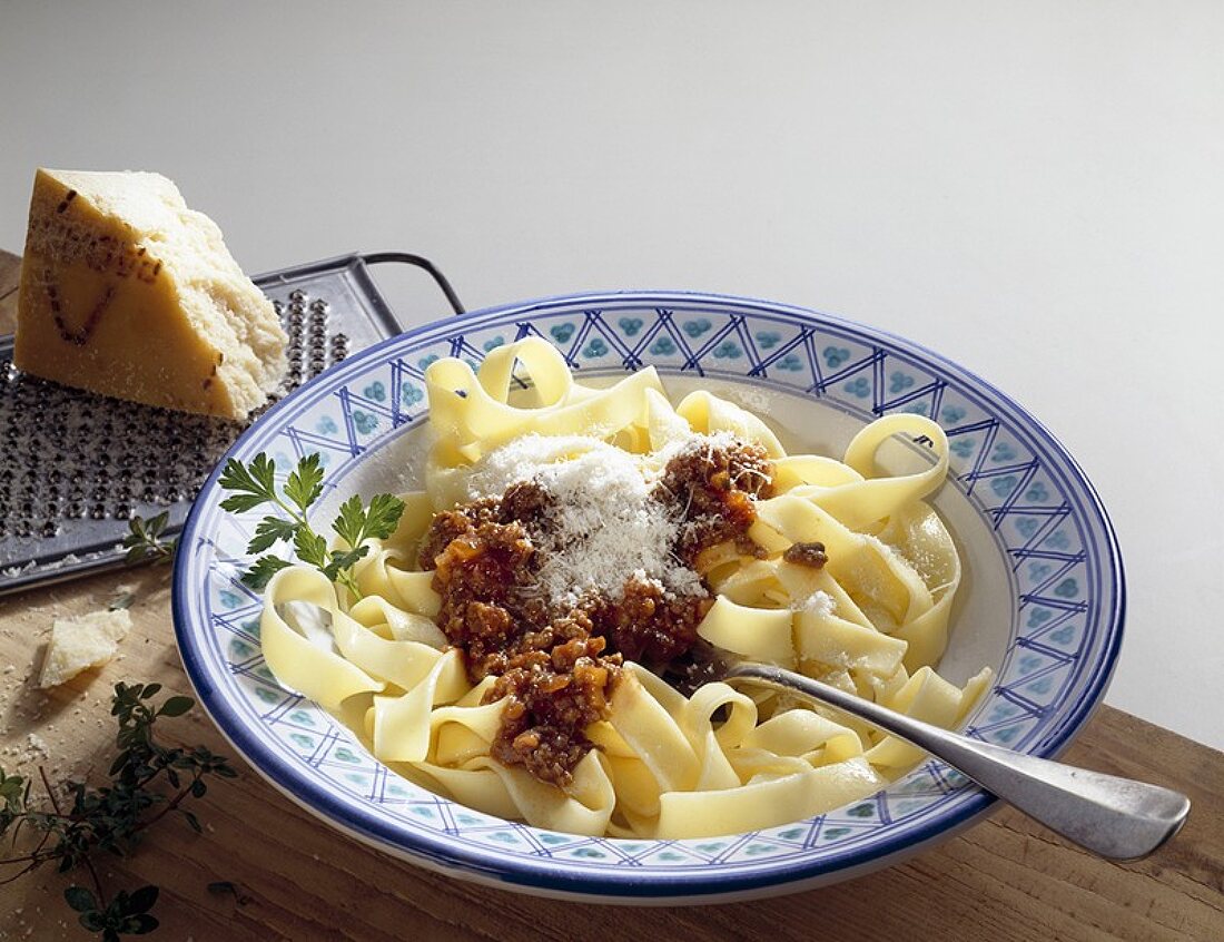 Tagliatelle with Bolognese sauce and grated Parmesan