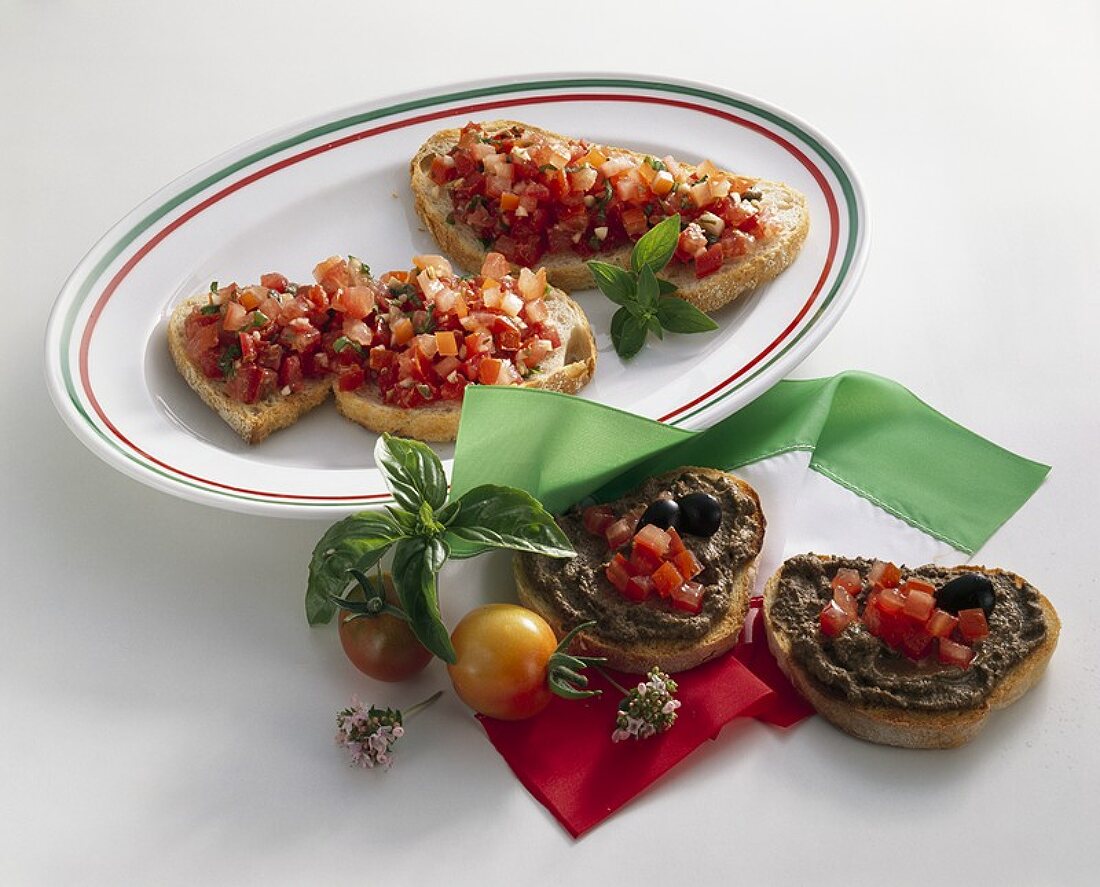 Crostini with tomatoes and olive paste