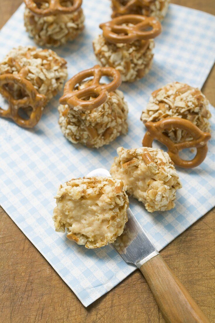 Small balls of Obatzda (Camembert spread) with pretzels