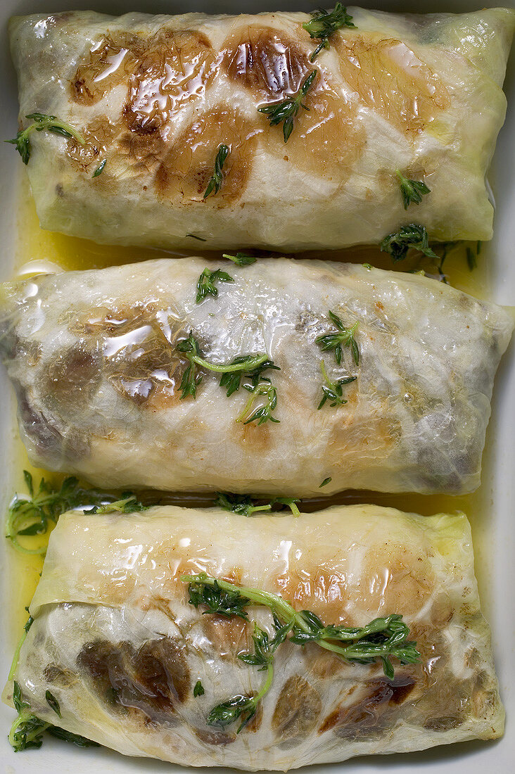 Glazed, stuffed cabbage leaves (overhead view)