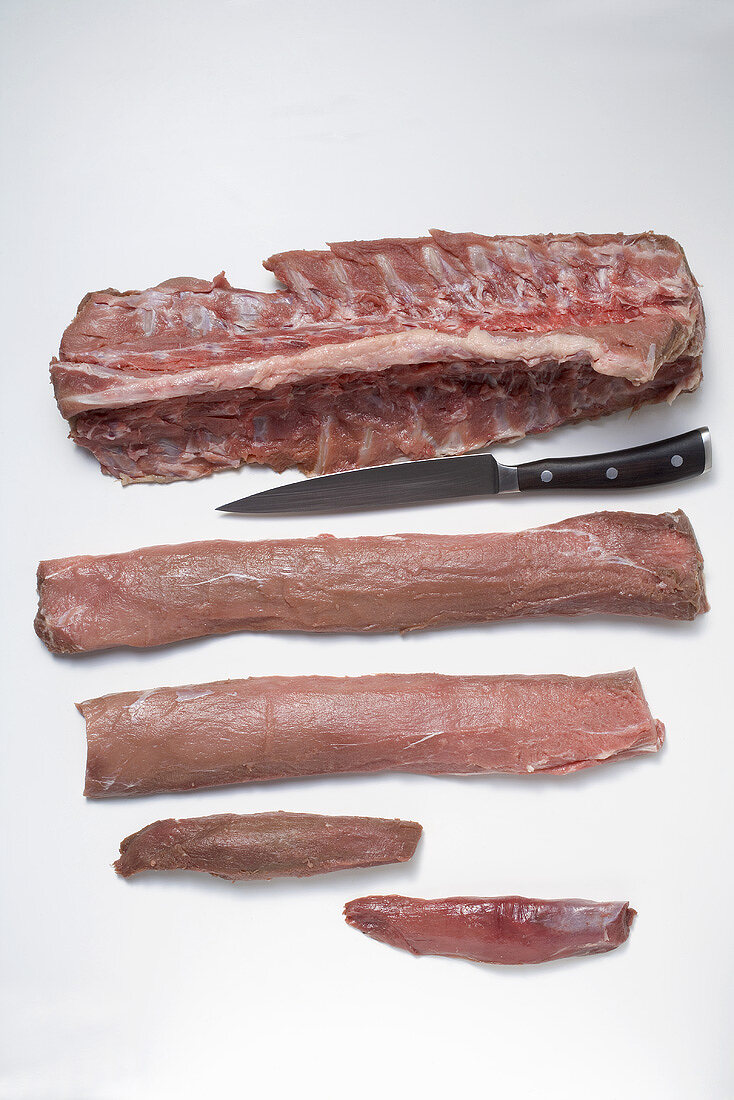 Raw pork fillets, ribs and chine bone
