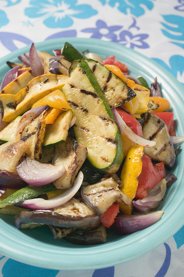 Grilled vegetables on blue plate