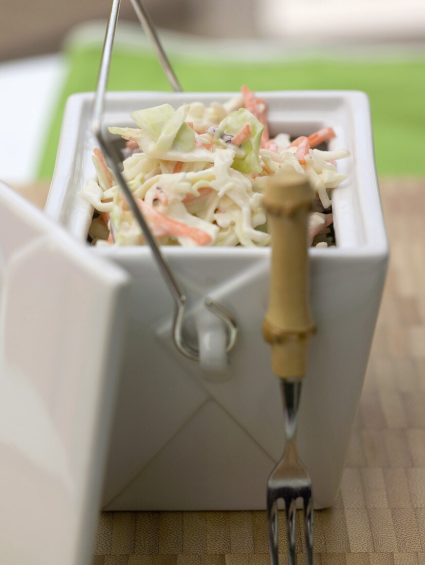 Coleslaw (cabbage salad, USA) in white container