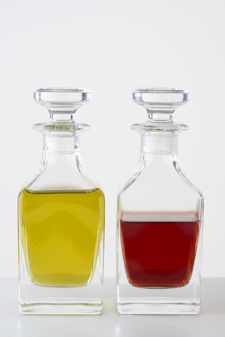 Olive oil and vinegar in small glass bottles