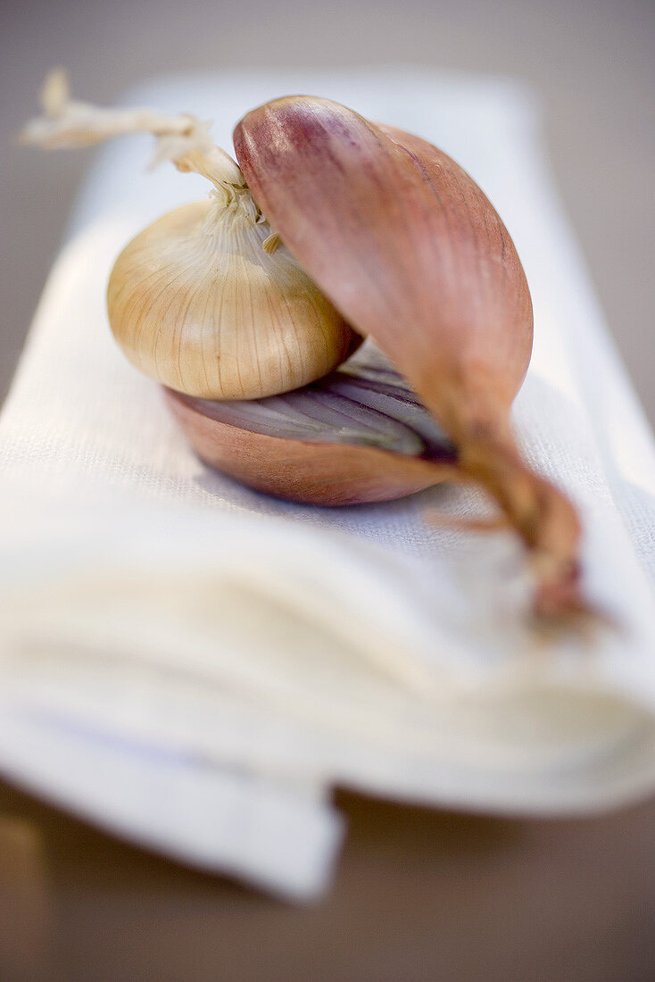 Small onion inside halved red onion