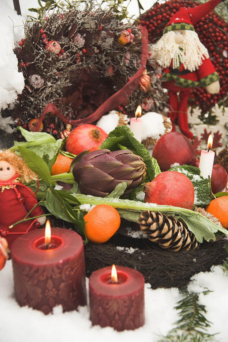 Christmas decorations in snowy garden (detail)