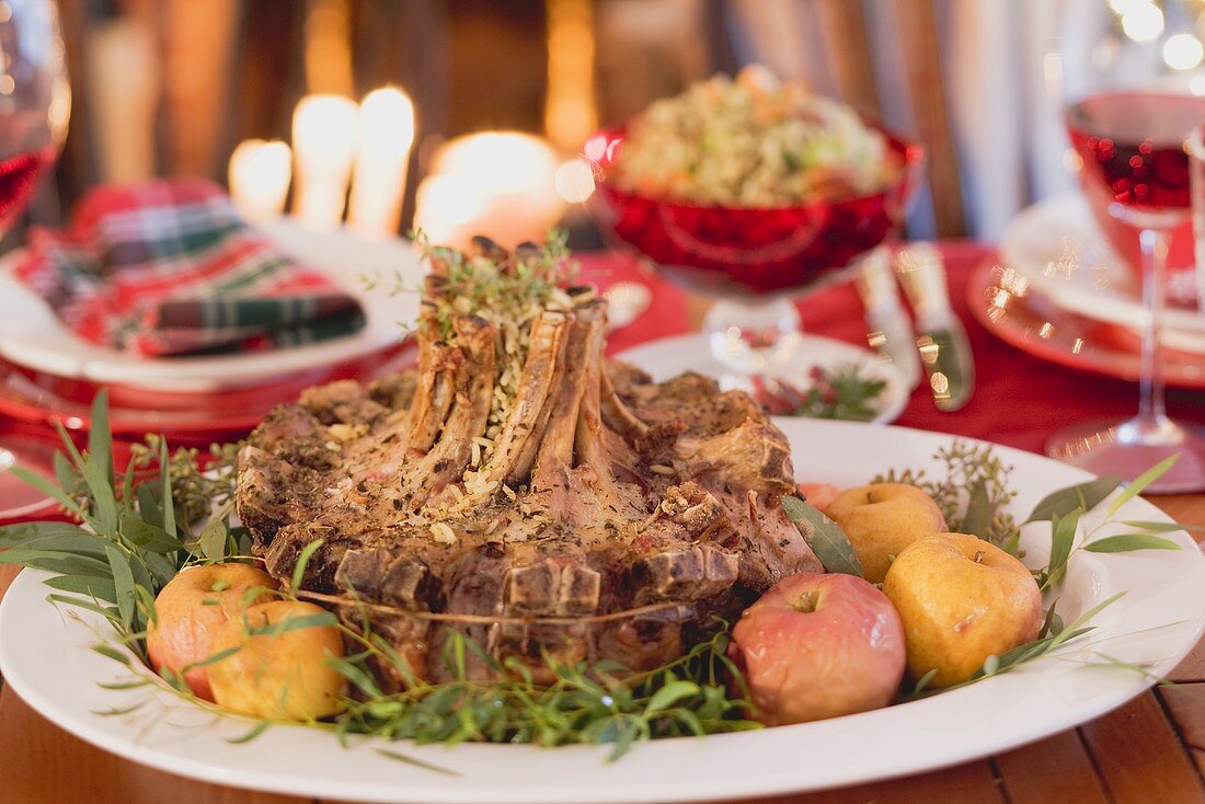 Crown roast of lamb with apples on Christmas table (USA)