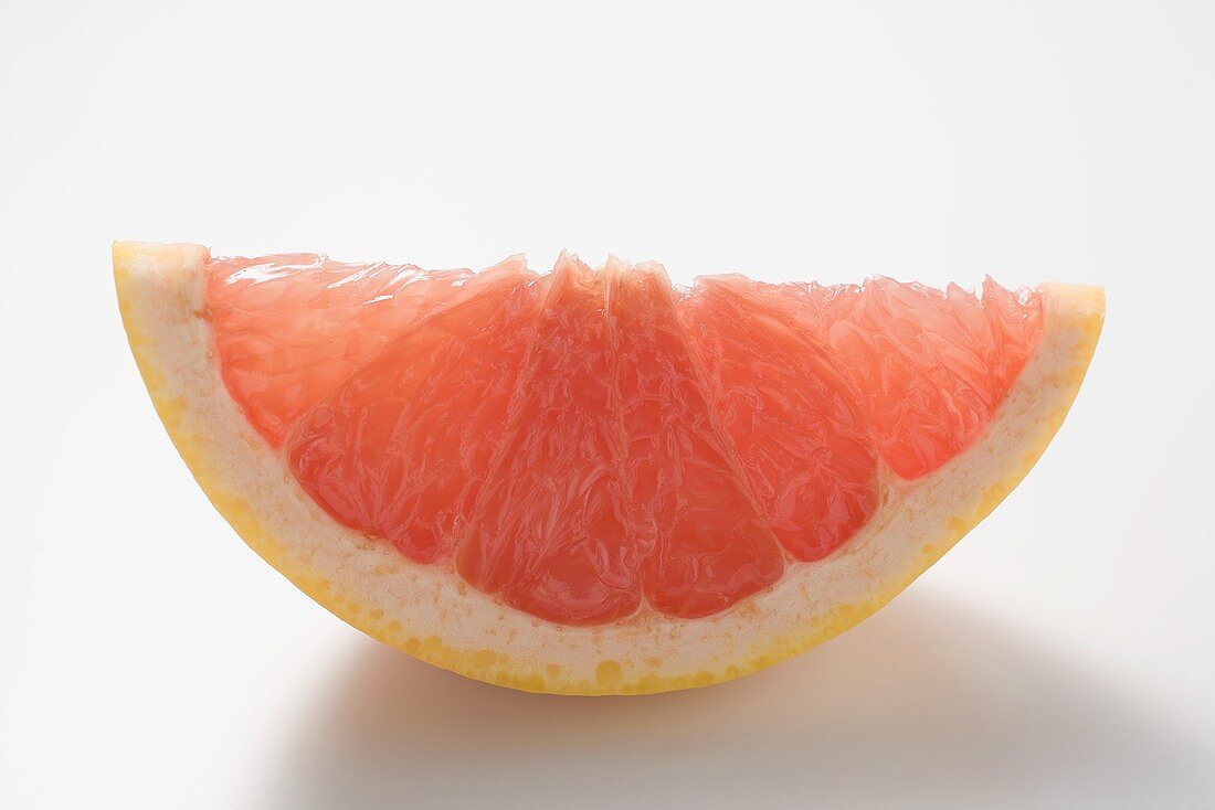 Wedge of pink grapefruit