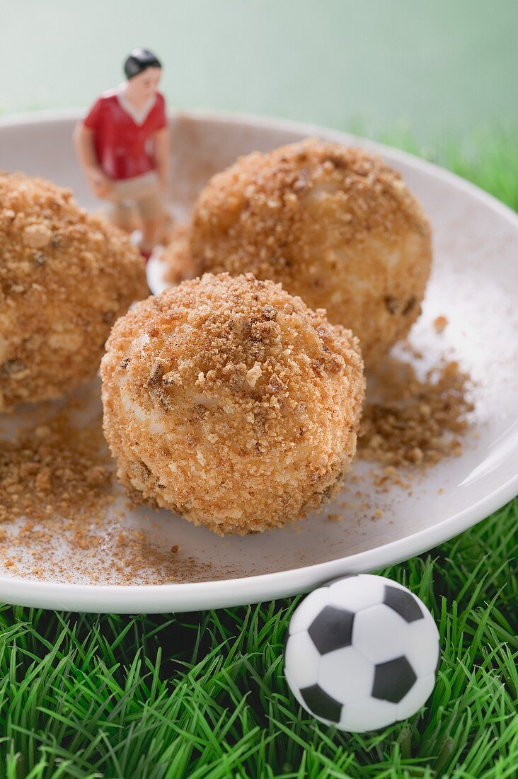Apricot dumplings with football figure and football