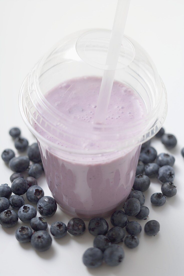 Blueberry shake in plastic cup with … – License Images – 965047