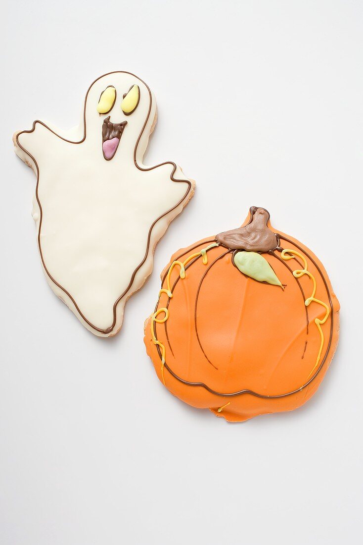 Two Halloween biscuits (ghost, pumpkin)