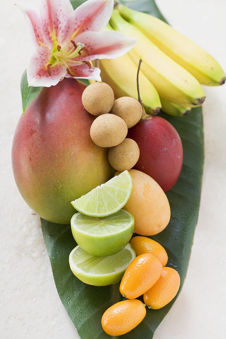 Assorted exotic fruits on banana leaf