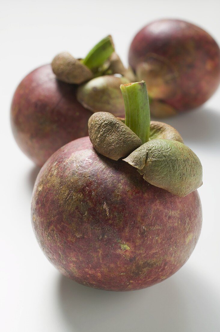 Three mangosteens