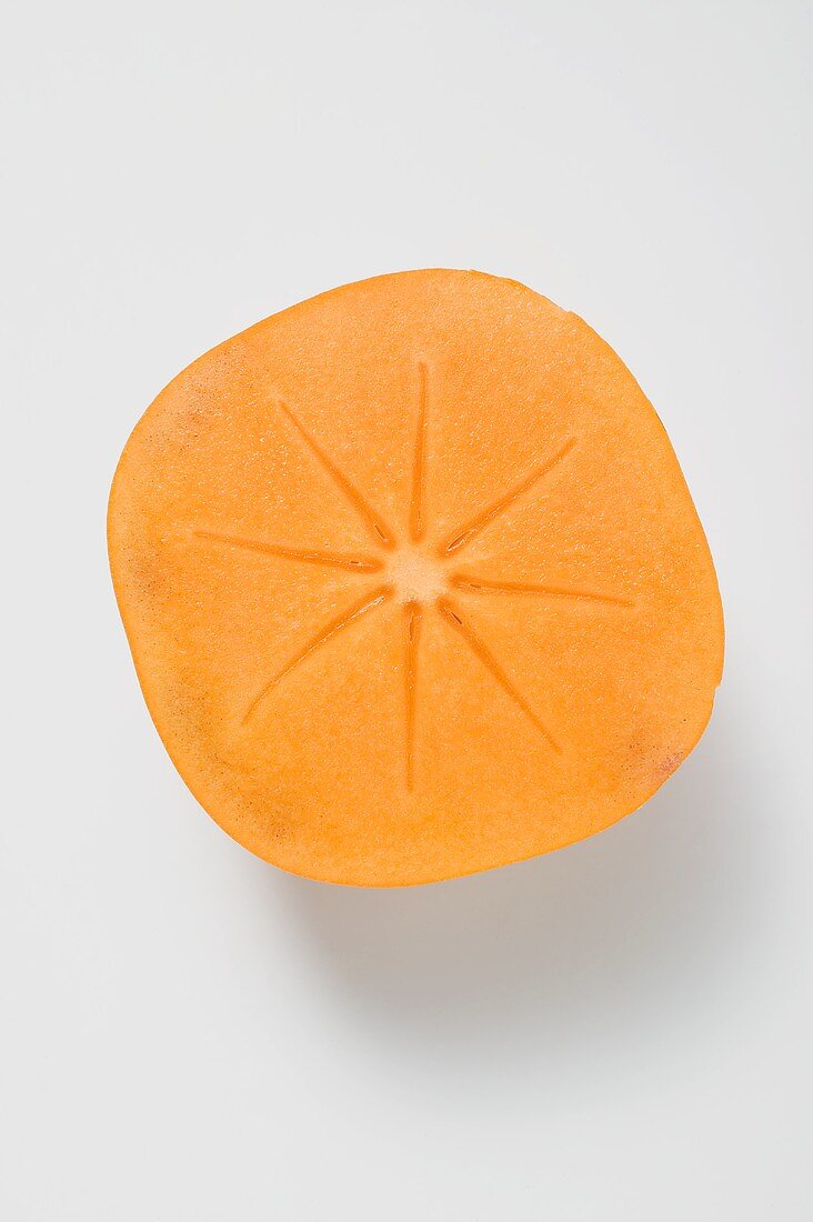 Half a persimmon (overhead view)